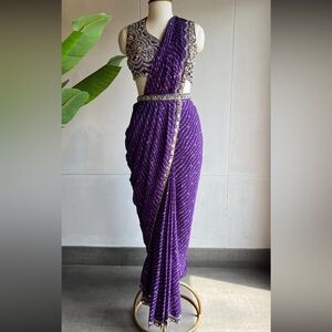 Purple pre draped saree with beaded top